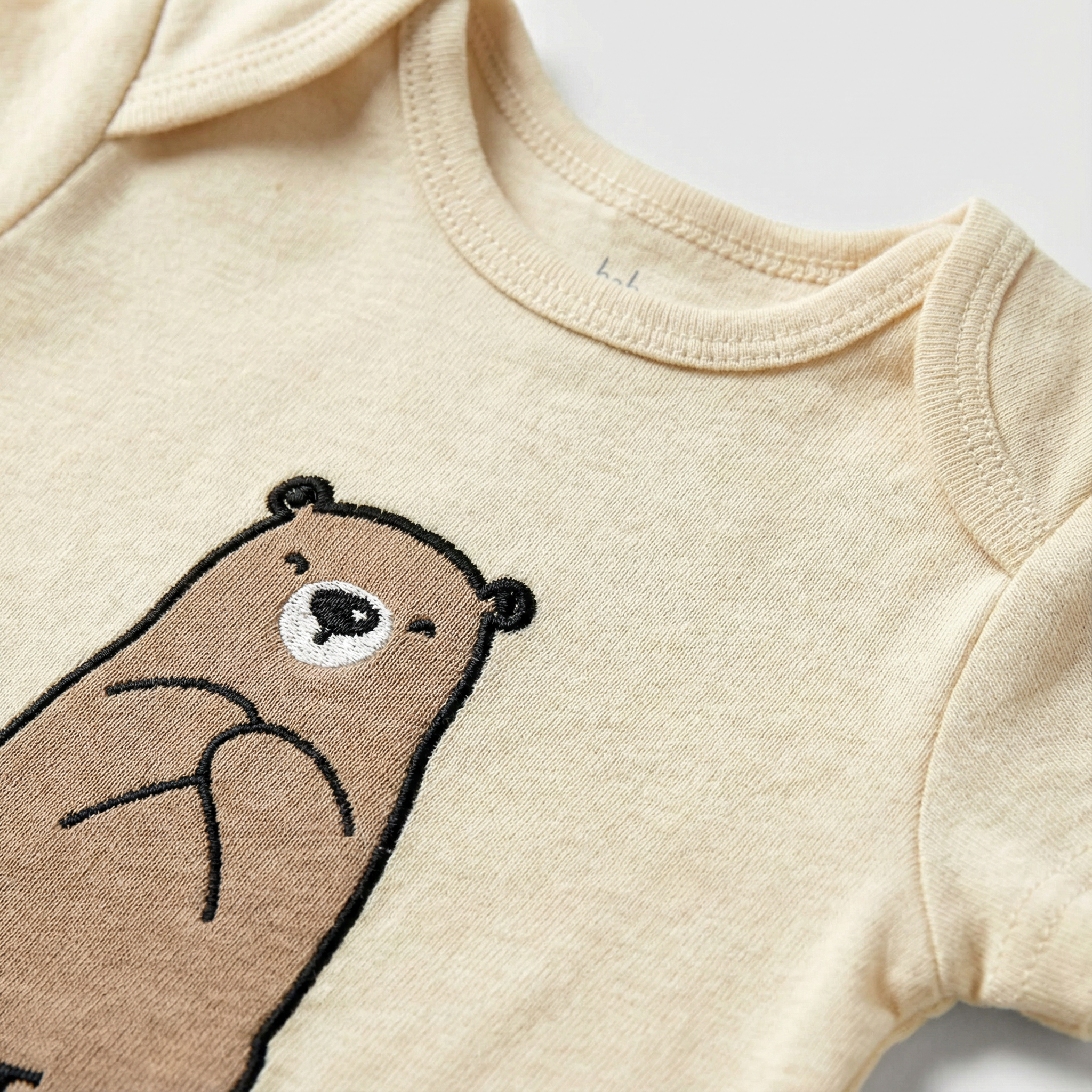 Body bébé beige à imprimé ours – Manches courtes 100 % coton